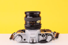 Load image into Gallery viewer, Canon AE-1 35mm Film SLR Camera with Kenlock MC 28mm f/2.8 Lens