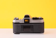 Load image into Gallery viewer, Canon AE-1 35mm Film SLR Camera with Sigma Mini-Wide II 28mm f/2.8 Lens