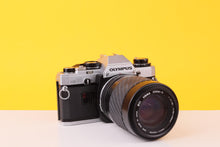 Load image into Gallery viewer, Olympus OM10 35mm Film SLR Camera with Sigma 70–210mm f/4–5.6 Telephoto Zoom Lens