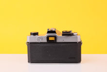 Load image into Gallery viewer, Fujica ST705 35mm Film SLR Camera with Fujinon 50mm Lens