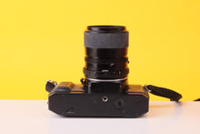 Load image into Gallery viewer, Vivitar V335 35mm Film SLR Camera with Vivitar 28–70mm f/3.5–4.8 Macro Zoom Lens