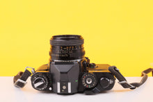 Load image into Gallery viewer, Chinon CE-4 35mm Film SLR Camera with Auto Chinon 50mm f/1.7 Lens