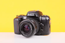 Load image into Gallery viewer, NIkon F-601 35mm SLR Film Camera with Nikkor 35-70mm f3.3-4.5 Lens