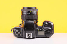 Load image into Gallery viewer, NIkon F-601 35mm SLR Film Camera with Nikkor 35-70mm f3.3-4.5 Lens