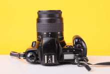 Load image into Gallery viewer, Canon EOS 3000 35mm Film SLR Camera with Canon EF 35–80mm f/4–5.6 Zoom Lens