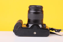 Load image into Gallery viewer, Canon EOS 3000 35mm Film SLR Camera with Canon EF 35–80mm f/4–5.6 Zoom Lens