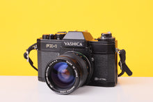 Load image into Gallery viewer, Yashica FX-1 Electro 35mm Film SLR Camera with Yashica ML Zoom 42–75mm f/3.5–4.5 Lens