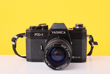 Load image into Gallery viewer, Yashica FX-1 Electro 35mm Film SLR Camera with Yashica ML Zoom 42–75mm f/3.5–4.5 Lens