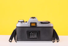 Load image into Gallery viewer, Minolta X-300 35mm Film SLR Camera with Tokina SD 28–70mm f/3.5–4.5 Zoom Lens