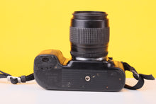 Load image into Gallery viewer, Nikon F50 35mm Film SLR Camera with AF Nikkor 35–80mm Zoom Lens