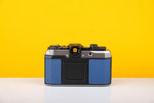 Load image into Gallery viewer, Pentax 17 35mm Half Frame Film Camera Blue Skin + FREE Expired Film Roll + 1 VCH T-shirt