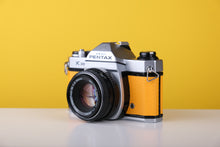Load image into Gallery viewer, Pentax K1000 35mm Film Camera with Pentax 50mm f/2 Lens in Yellow