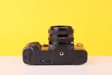 Load image into Gallery viewer, Canon T70 SLR 35mm Film Camera with Canon FD 50mm F1.8 Lens