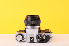 Load image into Gallery viewer, Olympus OM20 35mm SLR Film Camera with Zuiko 50mm f3.5 Lens