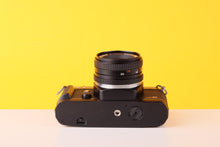 Load image into Gallery viewer, Olympus OM10 35mm Film Camera with Zuiko 28mm f2.8 Prime Lens Burgundy
