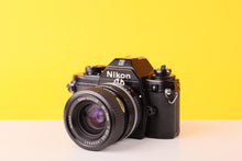 Load image into Gallery viewer, Nikon EM 35mm Film Camera with Nikon 35-70mm f/3.5 Lens
