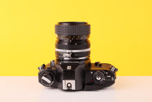 Load image into Gallery viewer, Nikon EM 35mm Film Camera with Nikon 35-70mm f/3.5 Lens