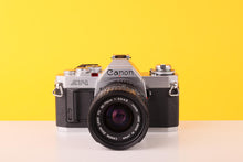 Load image into Gallery viewer, Canon AV-1 35mm Film Camera with Canon FD 35-70mm f/3.5 Prime Lens