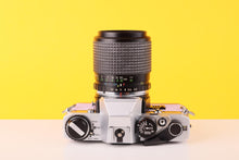 Load image into Gallery viewer, Olympus OM10 35mm SLR Film Camera with Zoom LENS 35-70mm f3.5 Lens in Lilac