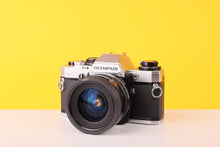 Load image into Gallery viewer, Olympus OM10 35mm SLR Film Camera with Tamron 28mm f/2.8 Prime Lens