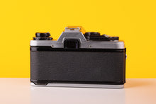 Load image into Gallery viewer, Olympus OM-10 35mm SLR Film Camera with Manual Adapter and Olympus OM-System E.Zuiko Auto-T 135mm