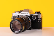Load image into Gallery viewer, Olympus OM-10 35mm SLR Film Camera with Manual Adapter and Olympus OM-System E.Zuiko Auto-T 135mm f3.5 Lens