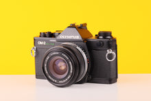 Load image into Gallery viewer,
Olympus OM-2 Spot/Program 35mm Film Camera with Olympus 28mm f3.5 Prime Lens