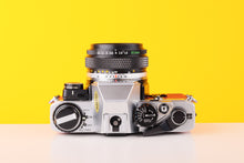 Load image into Gallery viewer, Olympus OM10 35mm Film Camera with Zuiko 50mm f1.8 Prime Lens Red