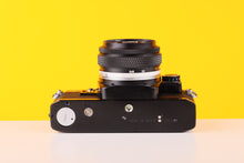 Load image into Gallery viewer, Olympus OM10 Black 35mm SLR Film Camera with Olympus OM-System Zuiko MC Auto-S 50mm f1.8 Lens and Manual Adapter 1