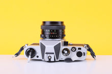 Load image into Gallery viewer, Chinon CS 35mm SLR Film Camera with 55mm f/1.7 Lens