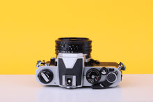 Load image into Gallery viewer, Nikon FM2n 35mm SLR Film Camera with Nikon Series E 50mm f1.8 Lens