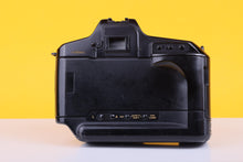 Load image into Gallery viewer, Canon T90 35mm Film Camera with Canon 28mm f/2.8 Lens