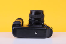 Load image into Gallery viewer, Canon T90 35mm Film Camera with Canon 28mm f/2.8 Lens