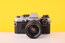 Load image into Gallery viewer, Olympus OM10 35mm Film Camera with 28mm f2.8 MC Lens with Manual Adapter