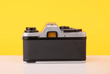 Load image into Gallery viewer, Olympus OM10 35mm Film Camera with 28mm f2.8 MC Lens with Manual Adapter