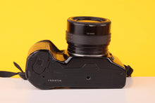 Load image into Gallery viewer, Minolta Dynax 5xi 35mm SLR Film Camera with Sigma AF 35-70mm f4- 5.6 Zoom Lens