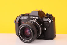 Load image into Gallery viewer, Nikon F-301 35mm SLR Film Camera with Nikkor 35-70mm f3.3-4.5 Lens