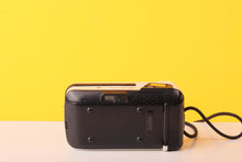 Load image into Gallery viewer, Canon Sure Shot Del Sol 35mm Point and Shoot Film Camera