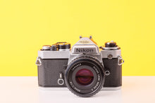 Load image into Gallery viewer, Nikon FE Silver 35mm Film Camera with Nikon 50mm f/1.8 Lens