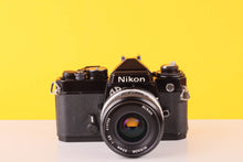 Load image into Gallery viewer, Nikon FE Black 35mm Film Camera with Nikon 35mm f/2.8 Lens