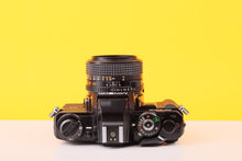 Load image into Gallery viewer, Minolta X-700 35mm SLR Film Camera with Samsung MD Rokkor 50mm f/1.4 Lens