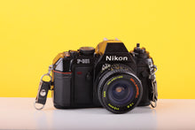 Load image into Gallery viewer, Nikon F-301 35mm SLR Film Camera with Bell & Howell 24mm f/2.8 Lens