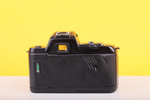 Load image into Gallery viewer, Nikon F-401s 35mm SLR Film Camera with AF Nikkor 50mm f/1.8 Lens