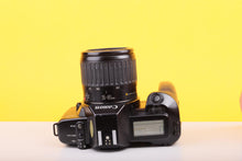 Load image into Gallery viewer, Canon EOS 650 35mm SLR Film Camera with Canon EF 35–80mm f/4–5.6 Zoom Lens