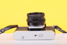 Load image into Gallery viewer, Asahi Pentax SP1000 35mm SLR Film Camera with Carl Zeiss Jena DDR Tessar 50mm f/2.8 Lens