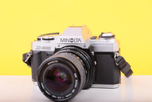 Load image into Gallery viewer, Minolta X-300 35mm SLR Film Camera with Minolta MD Zoom 28–70mm f/3.5–4.8 Lens