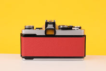 Load image into Gallery viewer, Olympus OM-1 35mm Film Camera with Olympus 28mm f/2.8 Prime Lens in Red