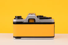 Load image into Gallery viewer, Olympus OM10 35mm SLR Film Camera with Olympus Zuiko 28mm f/2.8 Lens and Manual Adapter