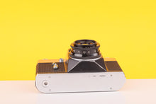 Load image into Gallery viewer, Zenit EM Silver 35mm Film Camera with Industar 50mm f/2 Lens