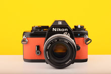 Load image into Gallery viewer, Nikon EM 35mm Film Camera with Nikon 50mm f/1.8 Lens